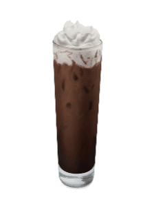 A tall glass of chocolate milk with whipped cream.